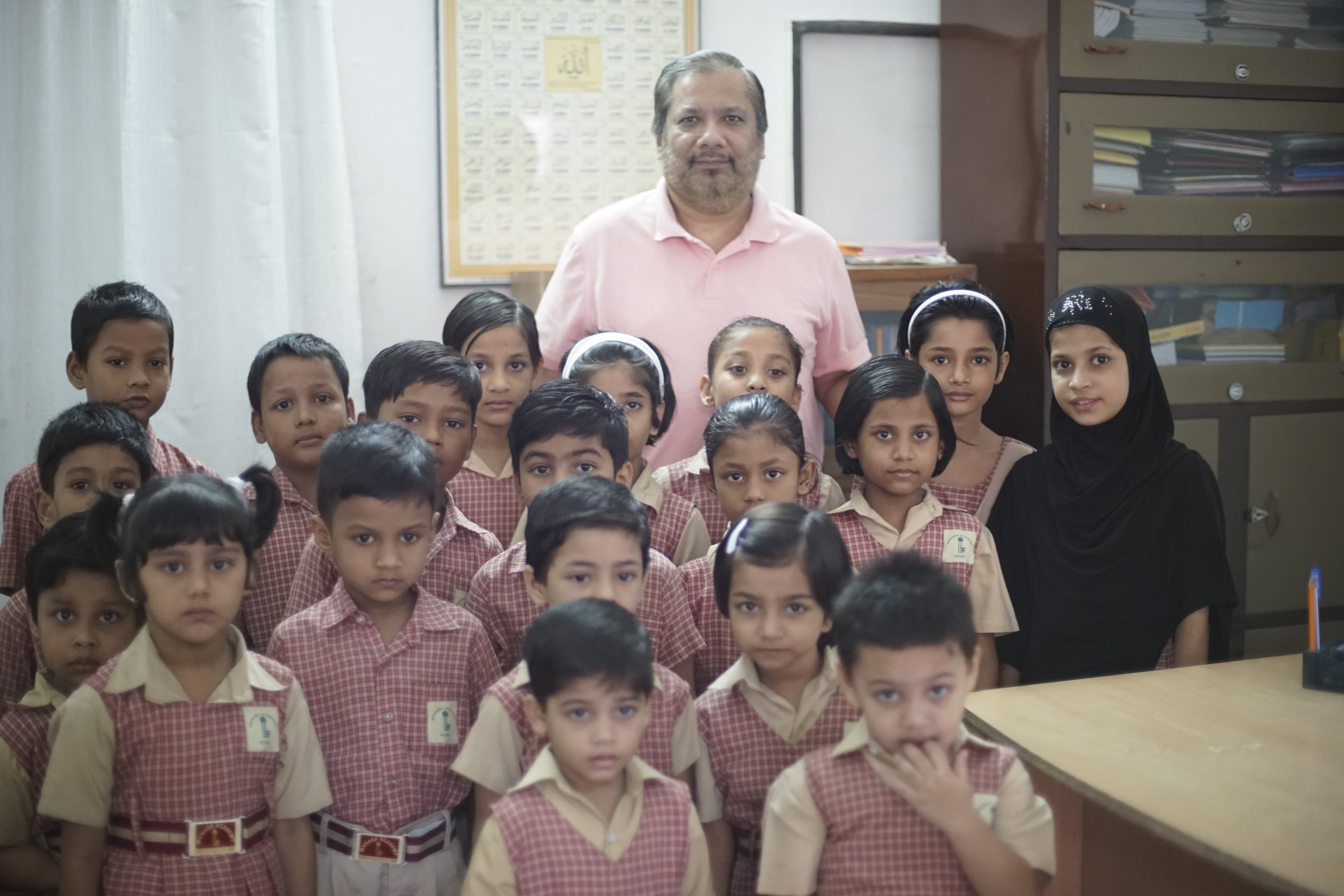Manara Academy's founder with the school's earliest batch of students