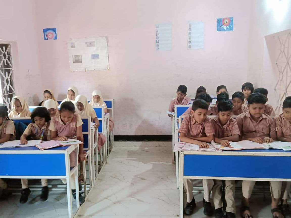 Students sitting in a classroom.